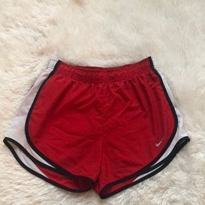 Nike red running shorts